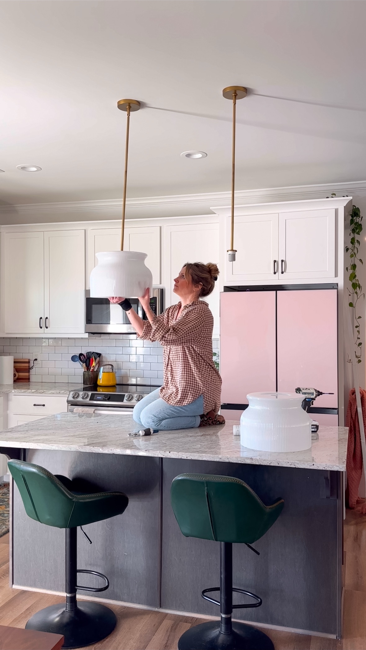 The island pendant lights that caused an impromptu kitchen mini makeover 😍 obsessed with the ribbed milk glass and the gorgeous gold. They give off such a warm glow too! 

#LTKFamily #LTKWatchNow #LTKHome