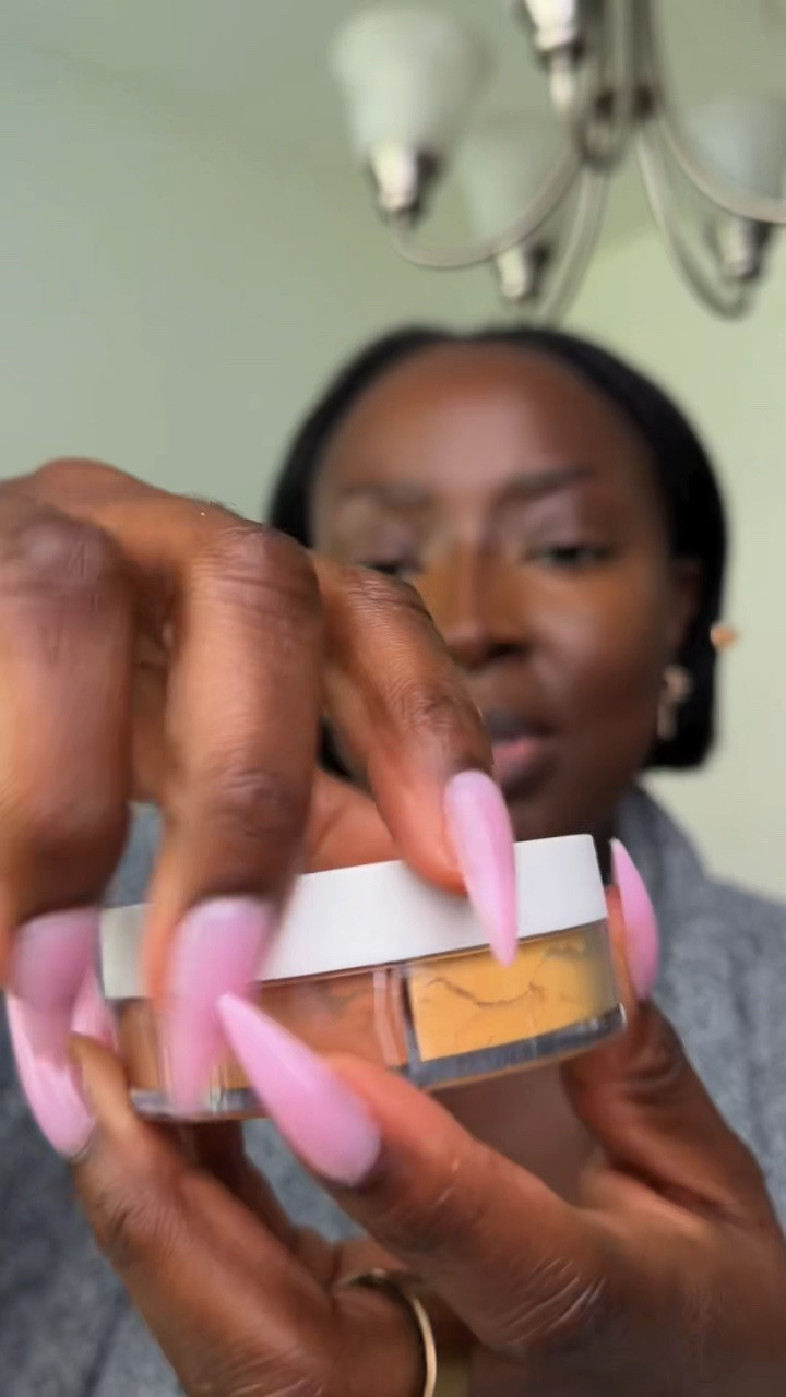 Applying the Morphe Bake & Set Loose Powder Quad (Rich Harmony) using a damp beauty sponge.