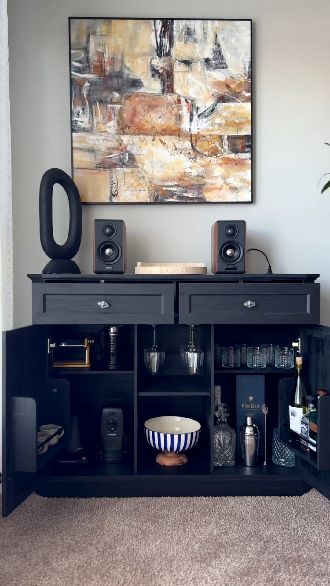 I finally found the perfect buffet cabinet to complete this corner of our home  @amberhaus_home and I’m obsessed! 🤎
It blends modern elegance with functionality, giving me both beautiful display space and smart storage.

✔️ Sleek dark wood finish that looks luxurious
✔️ Spacious interior for barware, kitchen essentials & decor
✔️ Perfect height for styling art, plants & speakers
✔️ Stur‍dy and high-quality craftsmanship
✔️ Instantly makes the room feel more polished

I styled it as a mini bar + decor station, and it transformed the entire vibe of the room.

If you love functional pieces that look designer without the designer price this is it.

Shop it from my link 🤍


#LTKSaleAlert #LTKHome #LTKstorytime