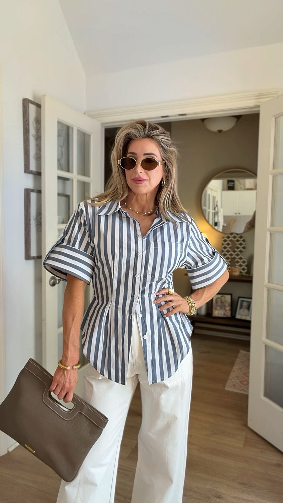 The fit of this stripe button down shirt had me immediately saying yes! 👏🏼 So chic!

Summer outfits, workwear, office outfits, white pants, sandals

#LTKgrwm #LTKOver40 #LTKootd