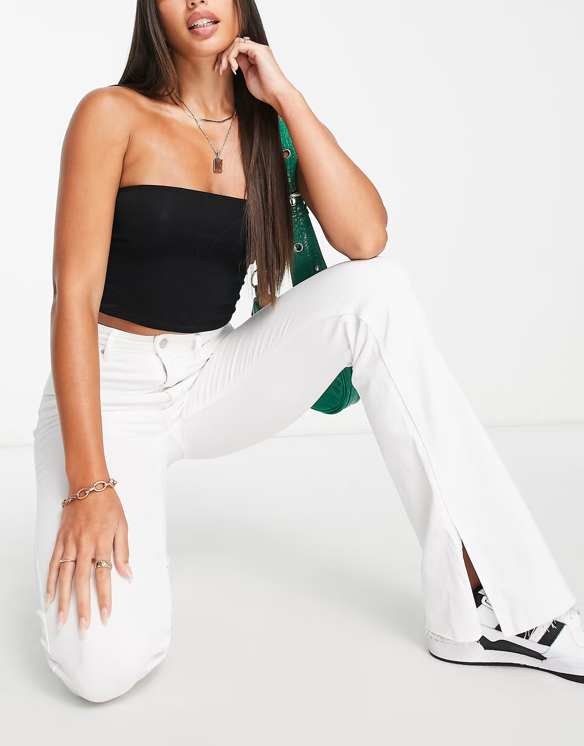 Stradivarius Tall stretch flare jean with split hem in white | ASOS (Global)