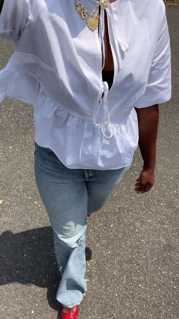 Tie front peplum top and straight leg jeans with either red flats or metallic sandals 

#LTKStyleTip #LTKSeasonal #LTKVideo