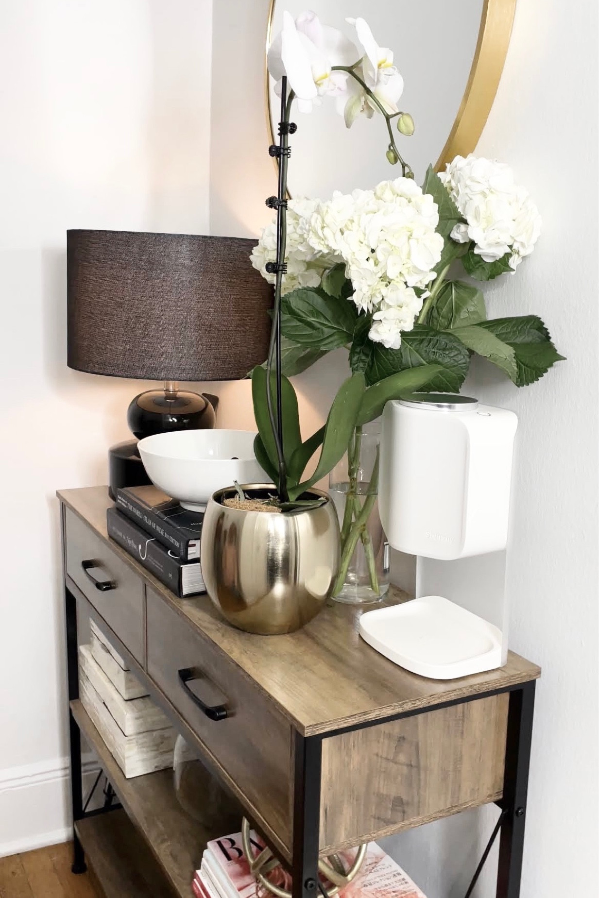 My entryway decor. 

Lamp, decor boxes, sanitizer dispenser, brass potter, table

#LTKSeasonal #LTKunder100 #LTKhome