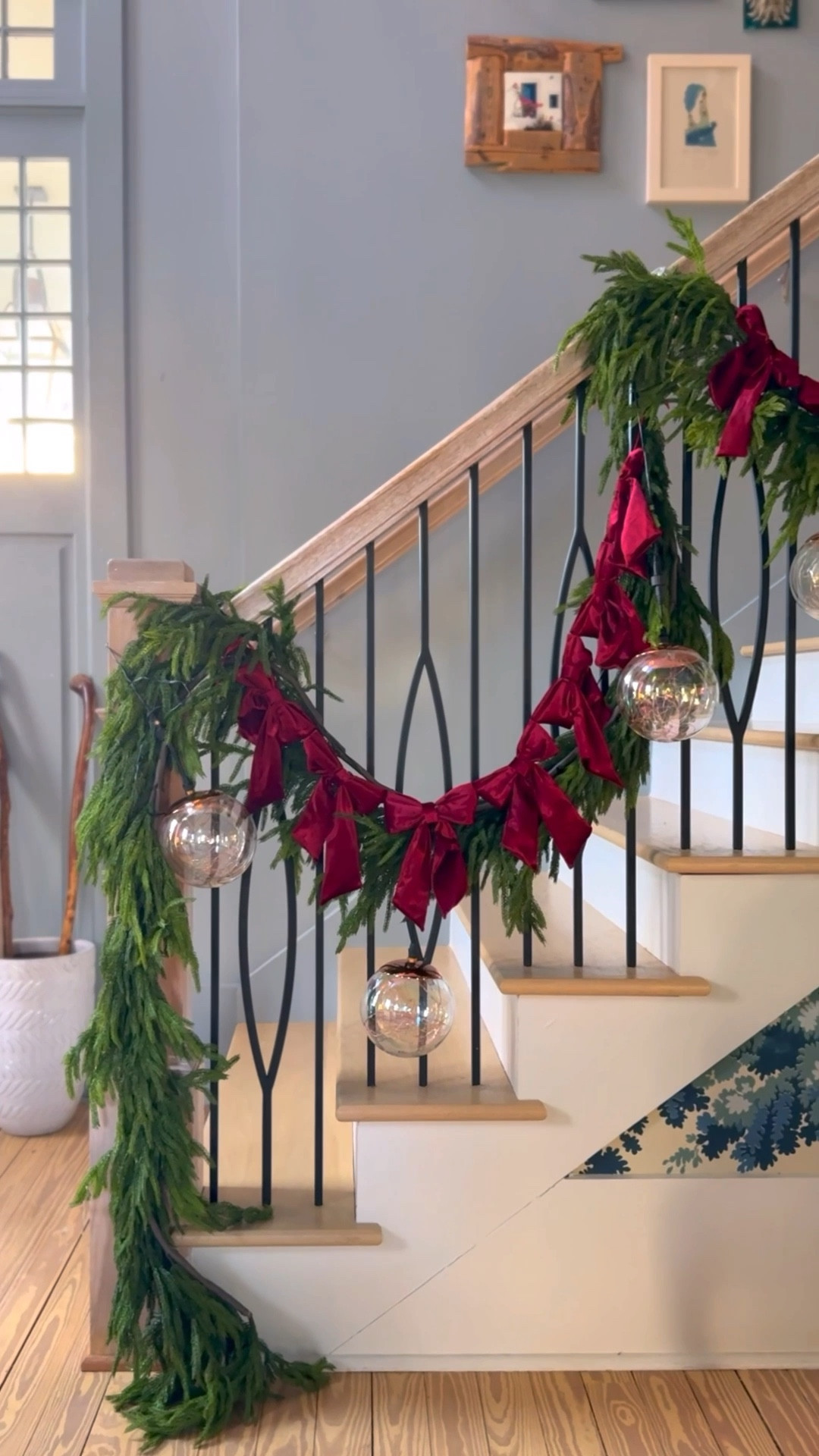 Foyer Garland ♥️
{bow garland is from shopaddisonswonderland.com} 

#LTKHome #LTKSeasonal #LTKHoliday
