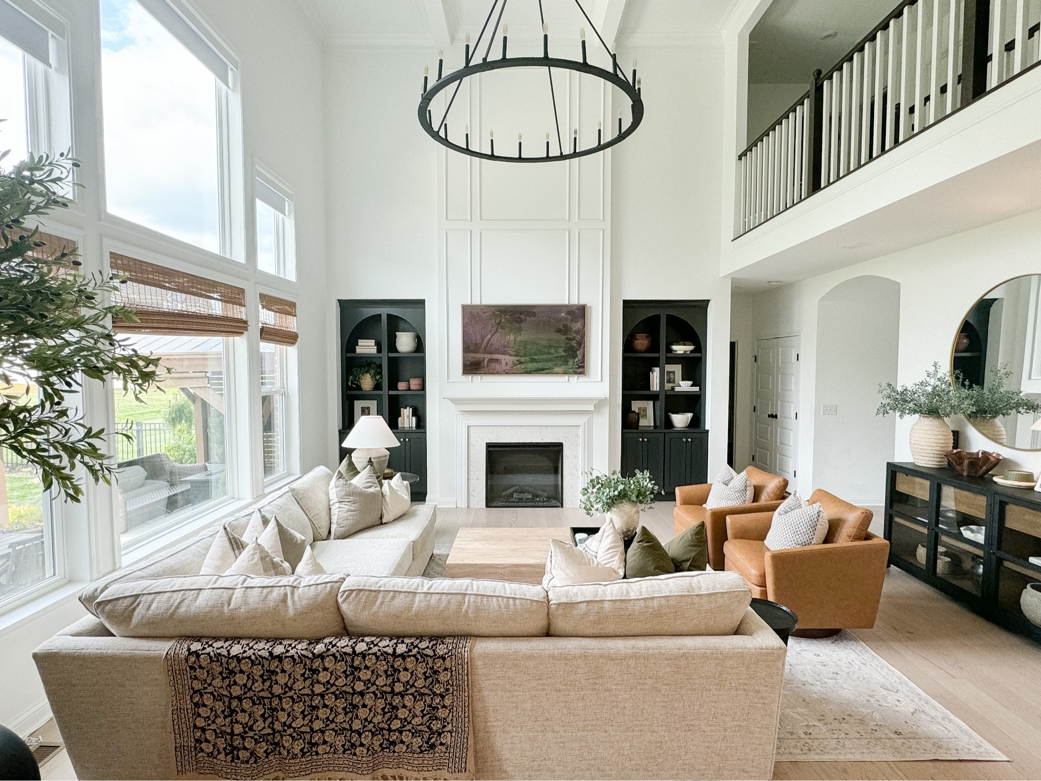 Living Room Links 

Sectional
Large Light
Built In
Accent Chair
Leather chair
Sideboard 
Coffee table
Vases
Art
Rug
Throw blanket 