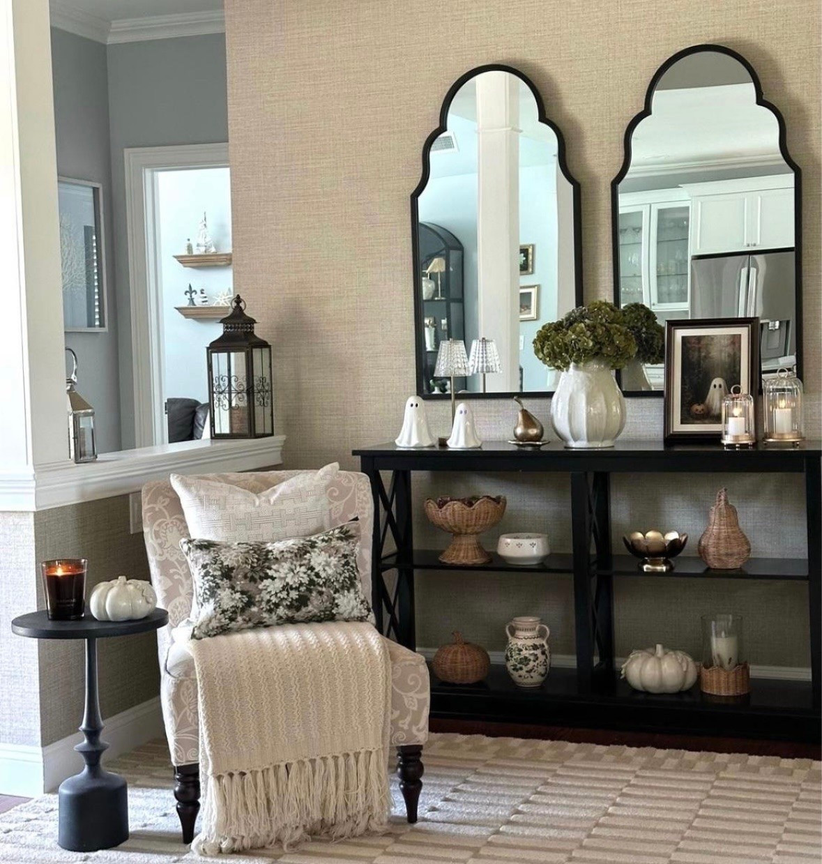 Fall entryway with a touch of Halloween! Shop cozy throw pillows, blanket, fall candles, ghosts on sale, vases, pumpkins, hydrangeas, area rug+ more! @Target  @Michaels  @Wayfair  Amazon home

#LTKHome #LTKSaleAlert