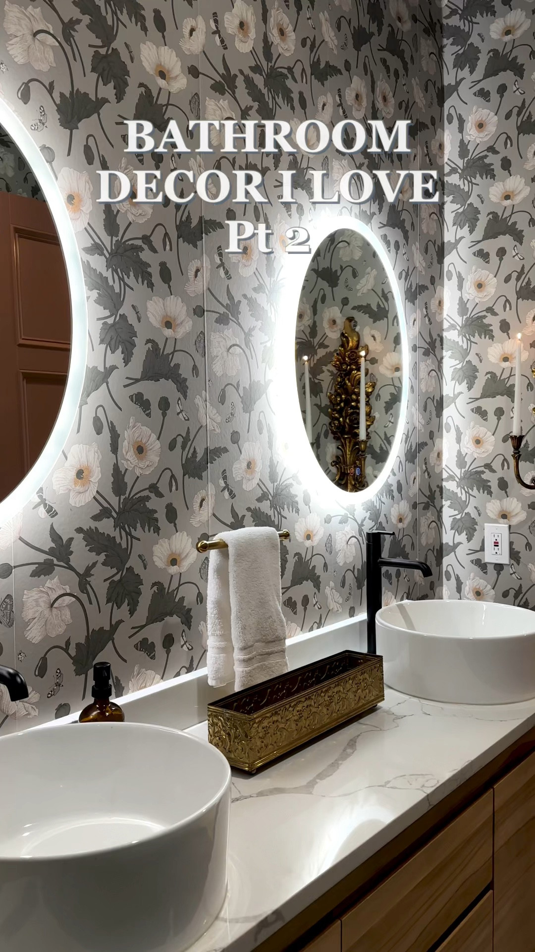 Home decor I love in my bathroom. Wallpaper info on lutzgohome.com gold candle sconces and gold planter are thrifted  

#LTKFindsUnder100 #LTKVideo #LTKHome