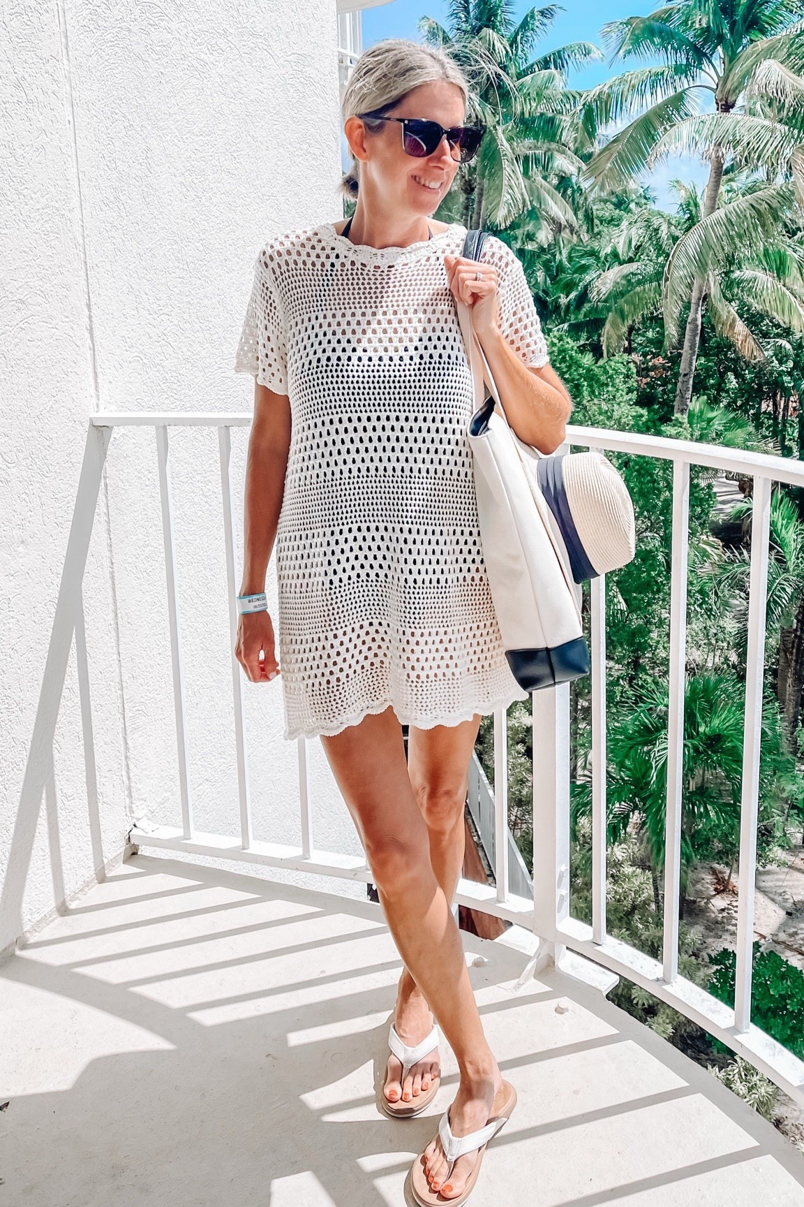 Amazon swimwear 
Crochet coverup is one of my favorites! Love it so much I bought it twice. Also in black. Wearing a small. Amazon Beach bag is lined with pockets and has straps that will hold your hat. Anne Cole swimsuit with rouching. Wearing a 6. Reef flip flops and cushioned and comfy enough to wear all day!  



#LTKSwim #LTKFindsUnder50 #LTKSeasonal