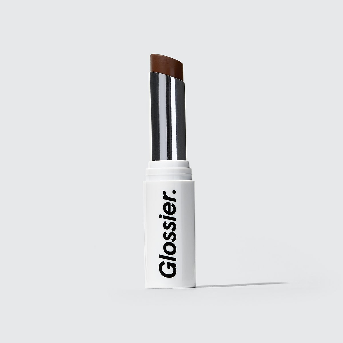 Glossier Generation G Lipstick in Jam, a deep berry magenta, 0.07 oz, enhancing sheer matte lipstick that adapts to you | Glossier