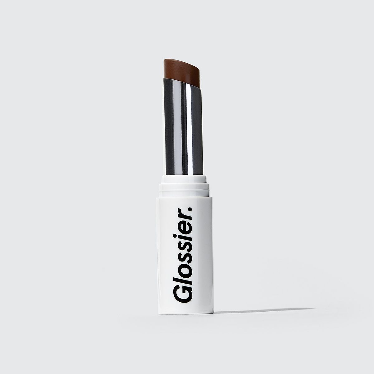 Glossier Generation G Lipstick in Jam, a deep berry magenta, 0.07 oz, enhancing sheer matte lipstick that adapts to you | Glossier