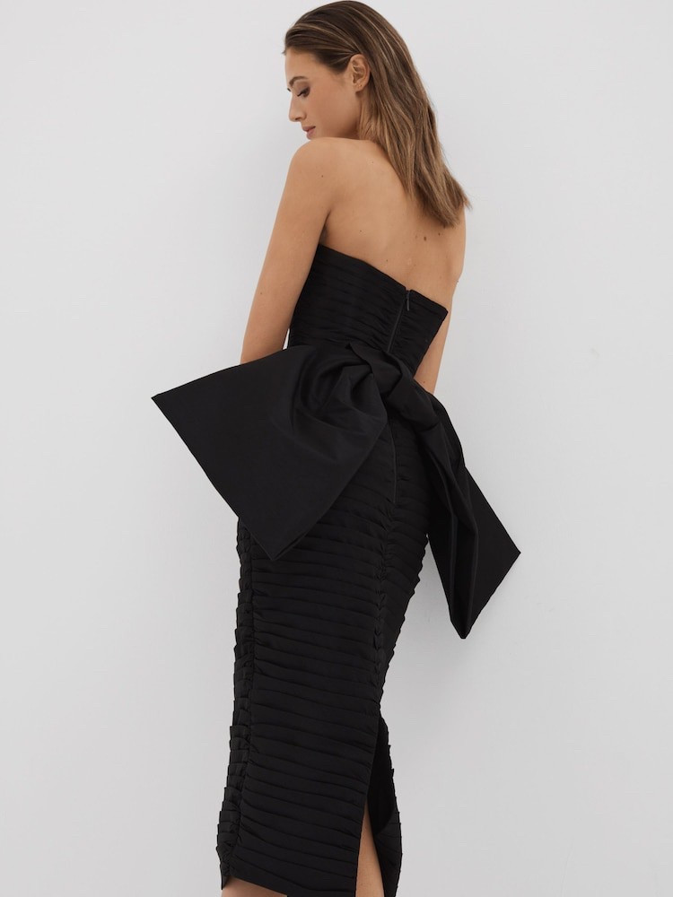 A bow-back Little Black Dress reminiscent of the beautiful gowns we always see at the Oscars! This beauty is from the Rachel Gilbert collection by Reiss - catch the last pieces on sale 🖤

#LTKsale #LTKuk #LTKeurope