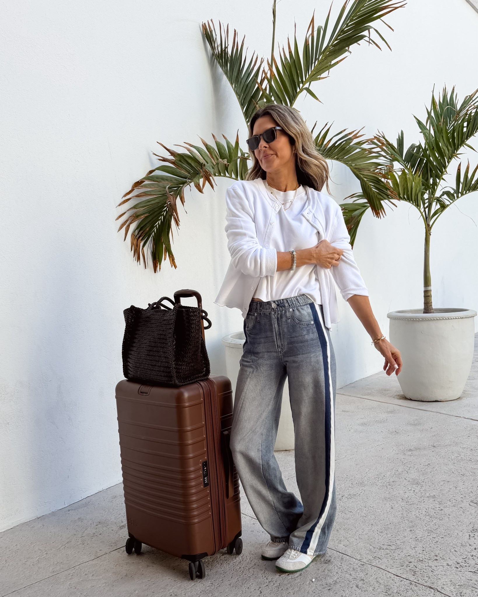 New sweatpant jeans sz XS I’m 5’6”. Washed on cold low temp - normal dry until they shirk length wise to you.   Can also get wet and stretch back out of you go too far. 
-live this woven bag for travel! 
-sneakers TTS 
-jersey cardi sz S 
-a favorite tee sz S 


#LTKOver40 #LTKTravel #LTKootd