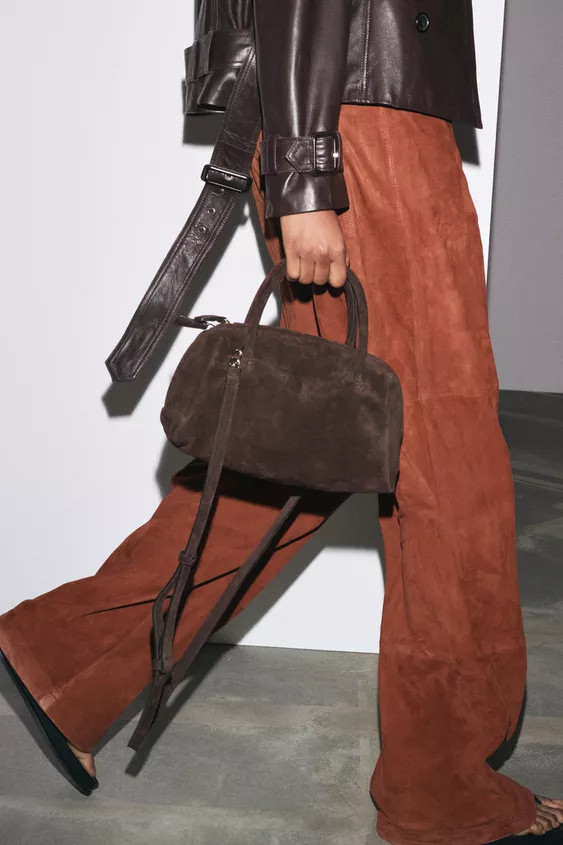 Split leather bowling bag. Two handles and a removable crossbody strap. Interior zip pocket. Doub... | Zara US