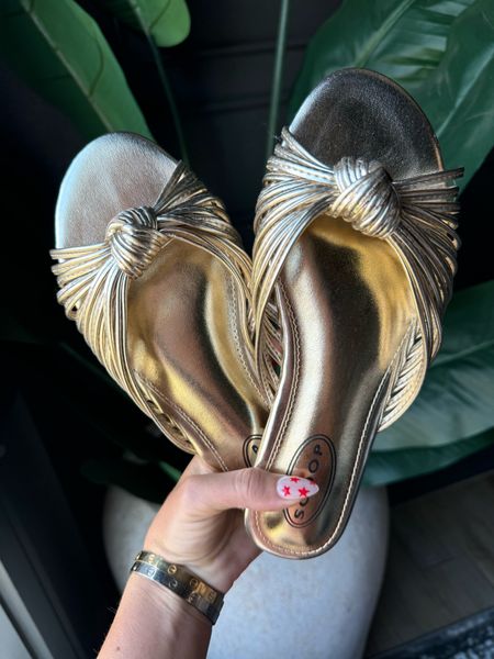 Love these gold sandals! Go up one size 