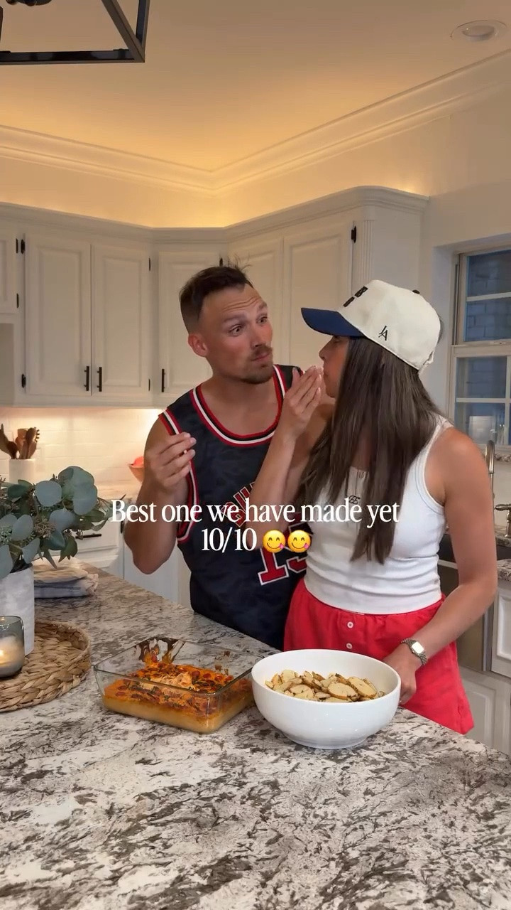 Our outfits + a dip recipe you need to try next!

NYC Pizza Dip for game 3 of the NBA finals 😋🏆🗽🍕 recipe below!

8 oz cream cheese, softened
1 cup sour cream
1 tsp garlic powder
1 tsp Italian seasoning
1½ cups marinara or pizza sauce
2 cups shredded mozzarella
¼ cup grated parmesan
20–30 slices pepperoni
Hot honey
Fresh basil for garnish

#nycfood #knicks #spurs #nbafinals #chipdip

#LTKootd #LTKfoodie #LTKMens