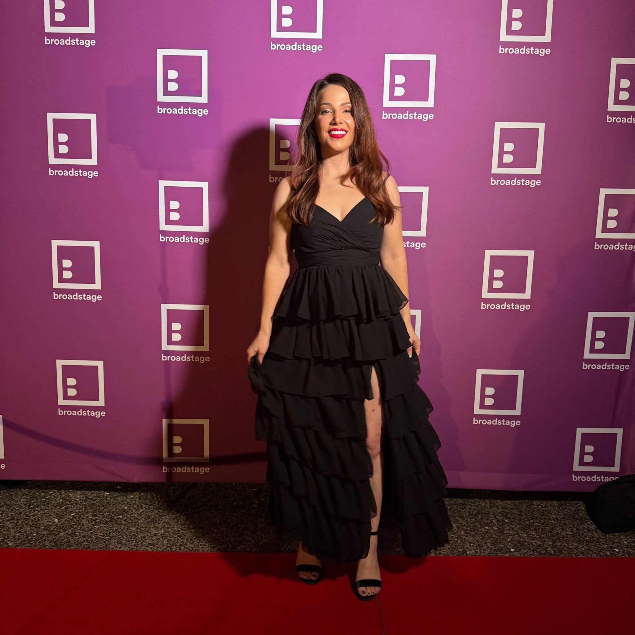 Black tiered ruffle dress with a leg slit 

#LTKootd #LTKValentine #LTKWedding