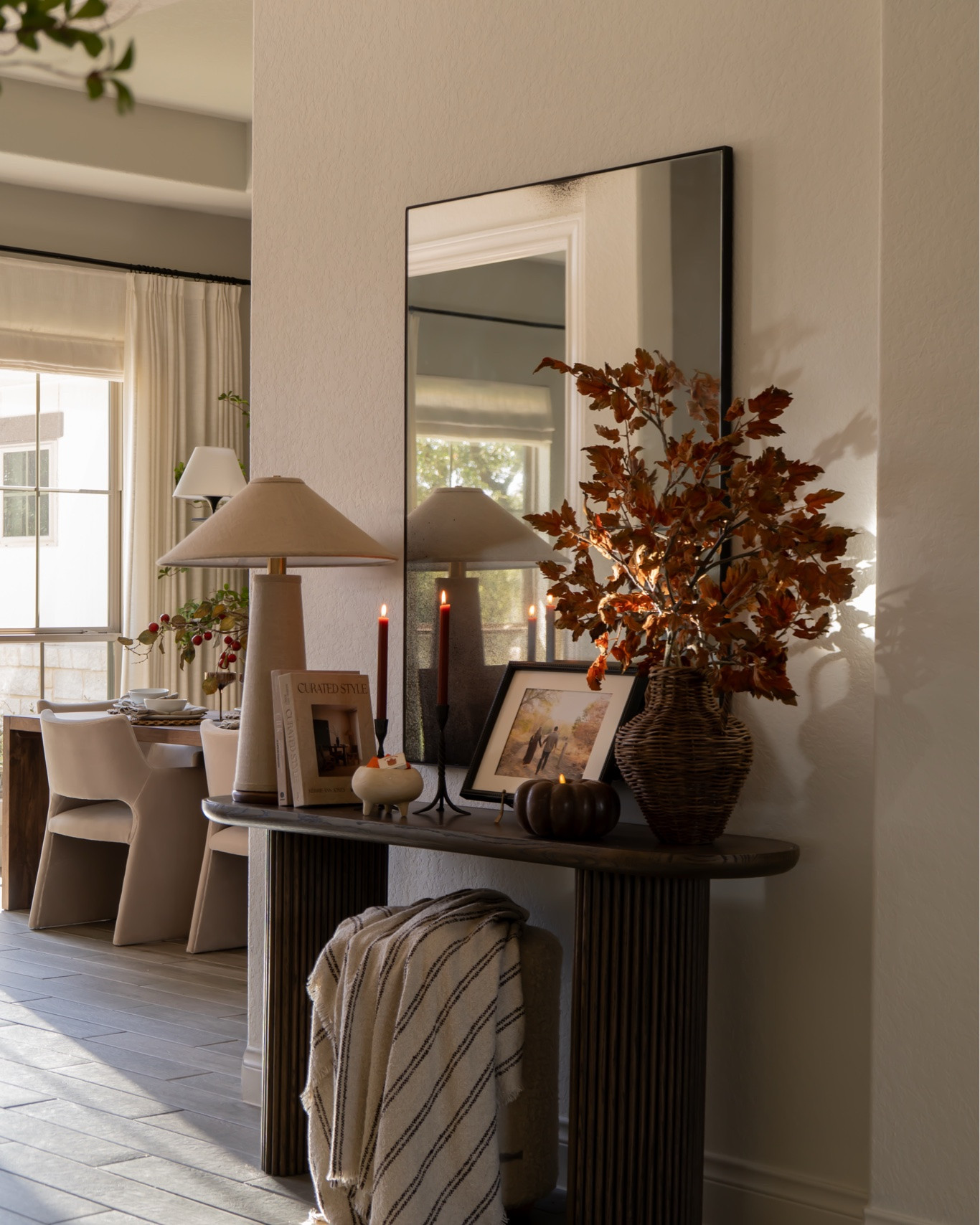 Fall in my entryway & console table styling that feels moody and elevated 🍂🤎

#LTKHome #LTKSeasonal #LTKSaleAlert