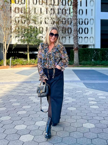 Utility maxi skirt in black paired with the cutest floral print top, opaque tights and chunky boots.


#LTKfindsunder50 #LTKstyletip #LTKover40