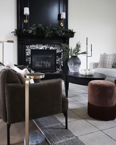 Christmas living room with ottomans, side table, and my favorite accent chairs from West Elm!

#LTKunder50 #LTKhome