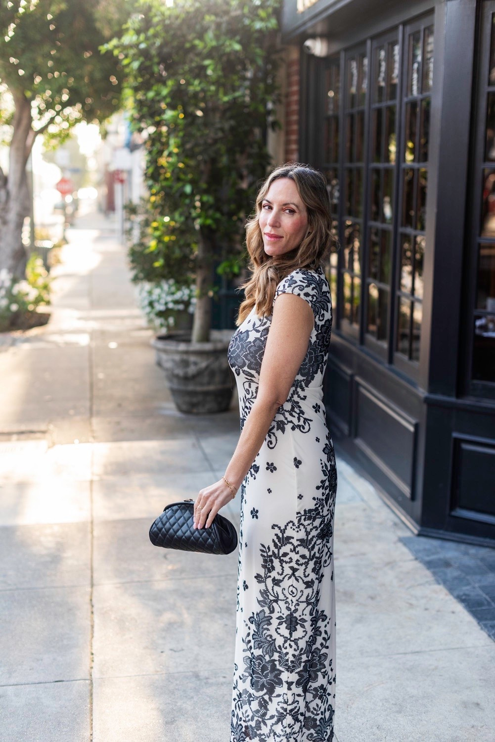 That golden hour look in my new favorite floral maxi. It made the Paris packing list because it doesn’t wrinkle, packs small and is so perfect for a night out. 🤍🖤 

#LTKOver40 #LTKMidsize #LTKTravel