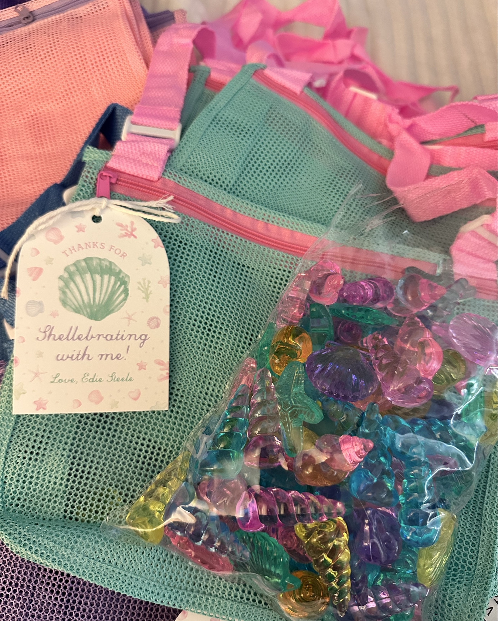 mermaid party favor prep 🧜‍♀️ 
🐚 shell catching bags with shell diving toys 

#LTKTravel #LTKKids #LTKParties