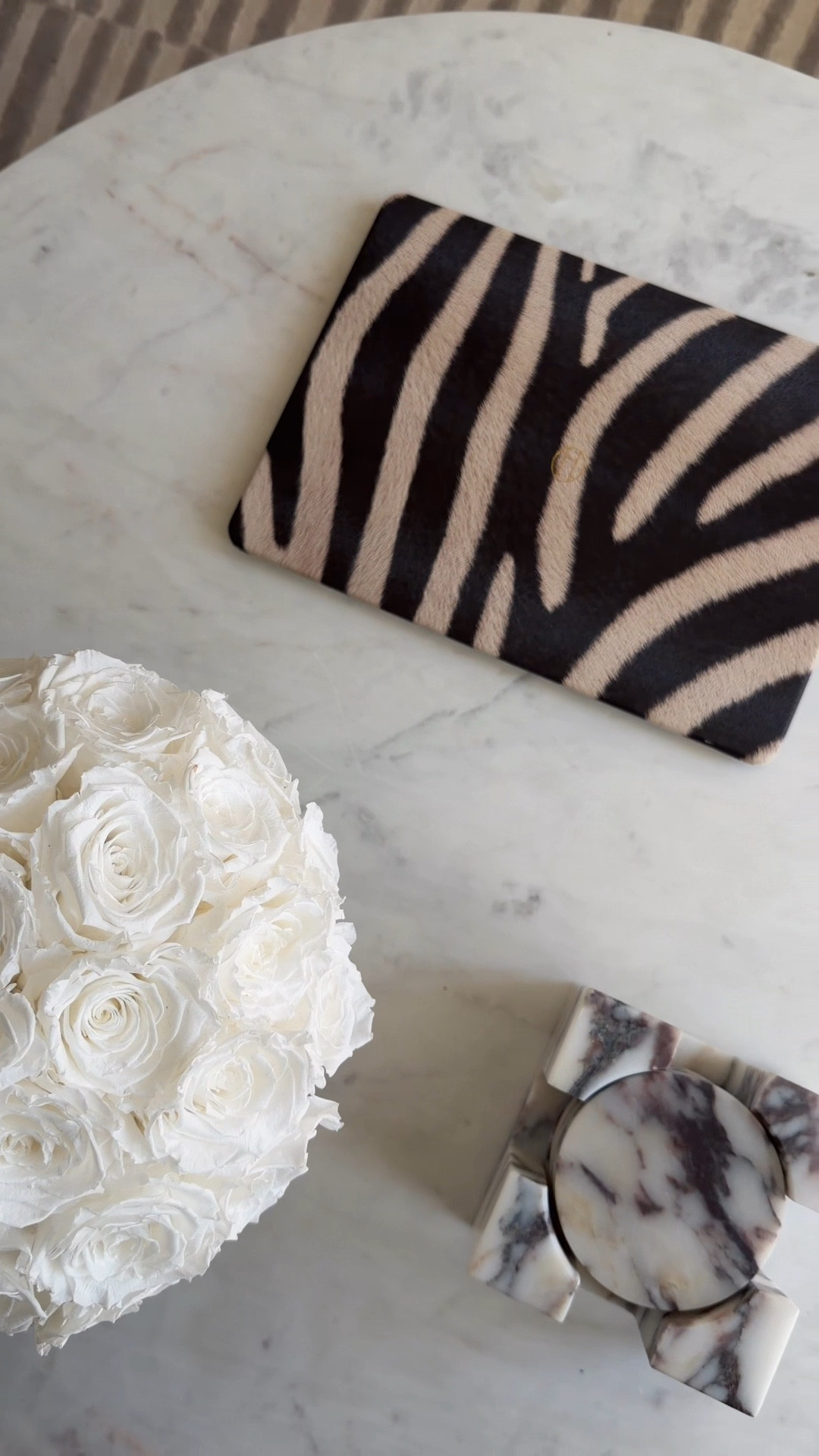 I love this zebra laptop case. It comes in many other animal prints too. Work, office, coffee, table, marble coasters.

#LTKHome #LTKSaleAlert