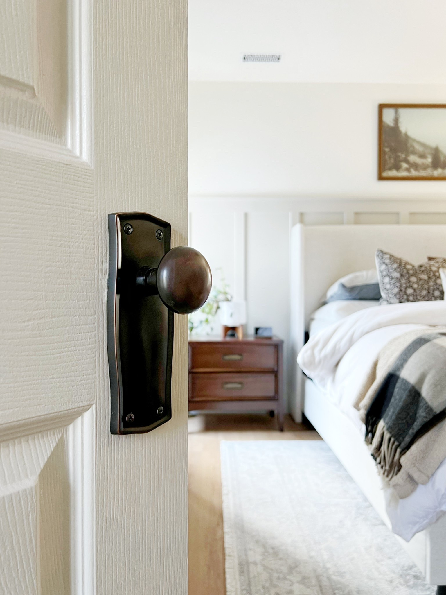 Classic door knob / neutral bedroom / wooden nightstand / white beddingg

#LTKHome