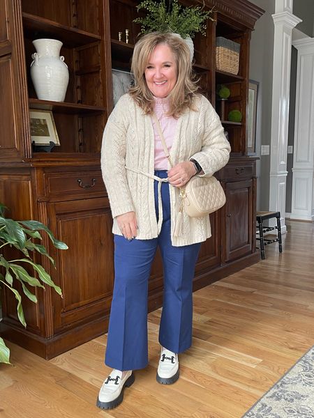 Updated navy pants for work or play. A fitted pant with flared cropped leg. (Size 14, true to size) Top with a sweet blouse (linking similar white blouse, pink stripe is not available) and a textured cardigan (size L). 

Don’t miss the fun earrings. 

A white loafer will be the perfect transition shoe. Mine are sold out. Linking similar. 

Work outfit. Valentines date night outfit 


#LTKunder50 #LTKSeasonal #LTKworkwear