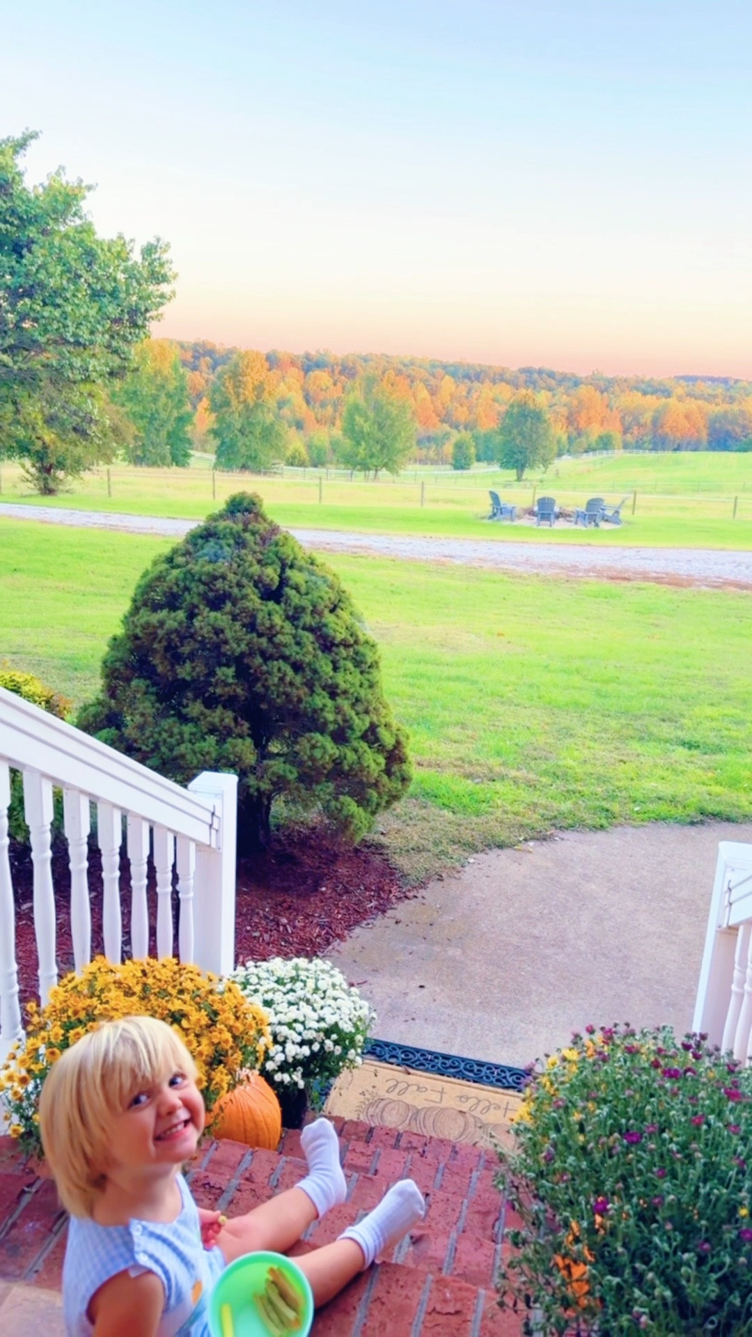 The most beautiful view here on the farmhouse front porch as we were waiting on “Dada” to get home 🏡 from work tonight 🥰 - I mean, look 🤩 at all those changing leaves 🍁🍃🍂 - it just totally took my breath away!!!! 😍 This place is such a dream!!! 💭