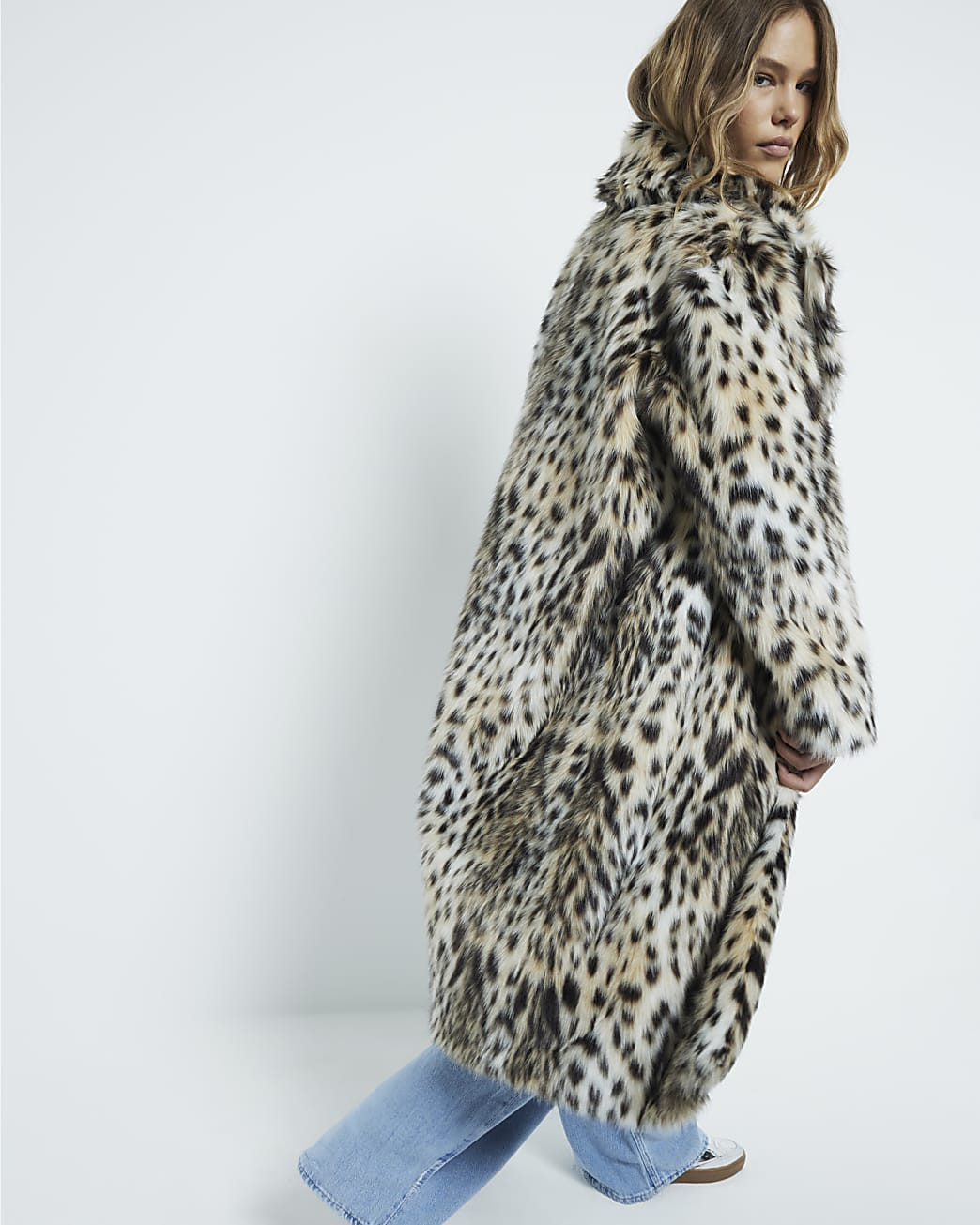 Brown faux fur leopard print coat | River Island (UK & IE)