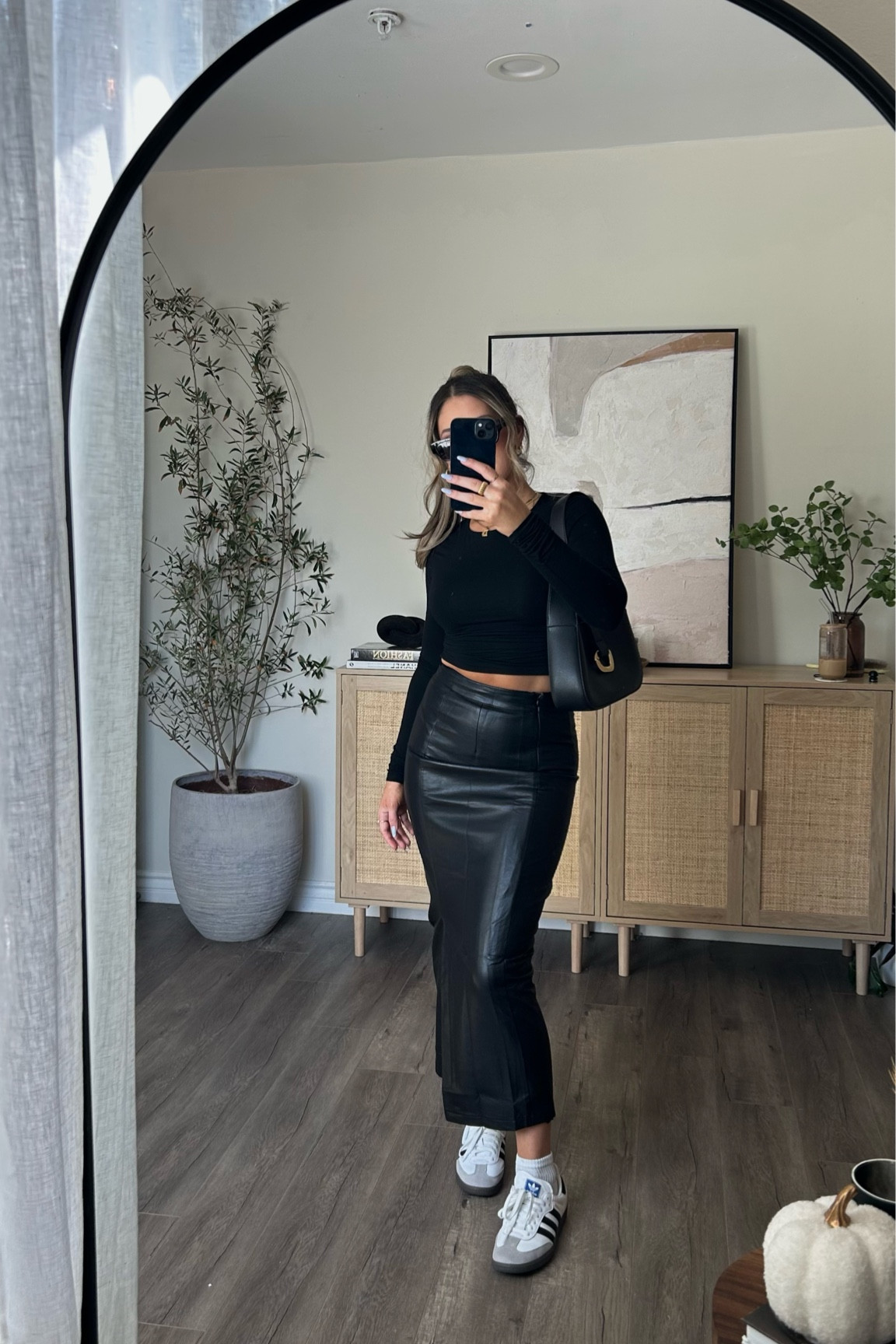 Black leather skirt outfit adidas Sambas

#LTKshoecrush #LTKSeasonal #LTKstyletip