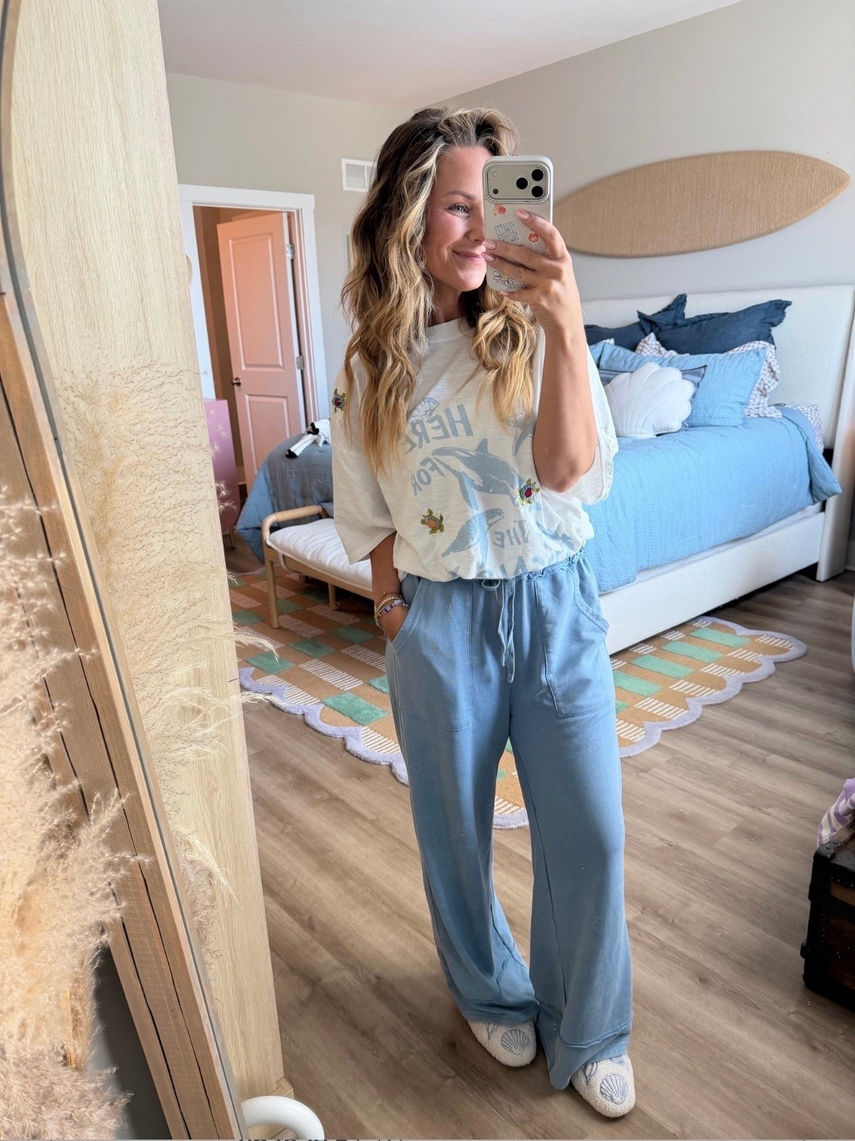 The pants everyone keeps asking about 🤍💙
Lightweight, insanely comfortable, and flattering without sacrificing comfort. These wide-leg pants are an easy yes for summer mornings, beach trips, errands, and everything in between. Linked my full look in LTK! ✨

#LTKFinds #LTKStyleTip #WideLegPants #SummerFashion #CasualOutfit #MomFashion #CoastalGrandmaStyle #EverydayStyle