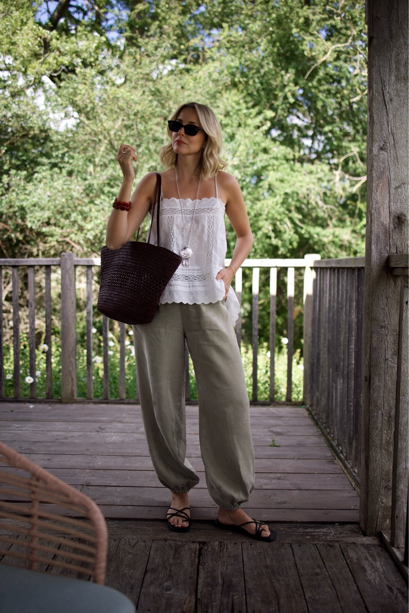 Khaki balloon trouser, dainty white top, pretty white blouse, basket bag,

#LTKuk #LTKsummer #LTKeurope