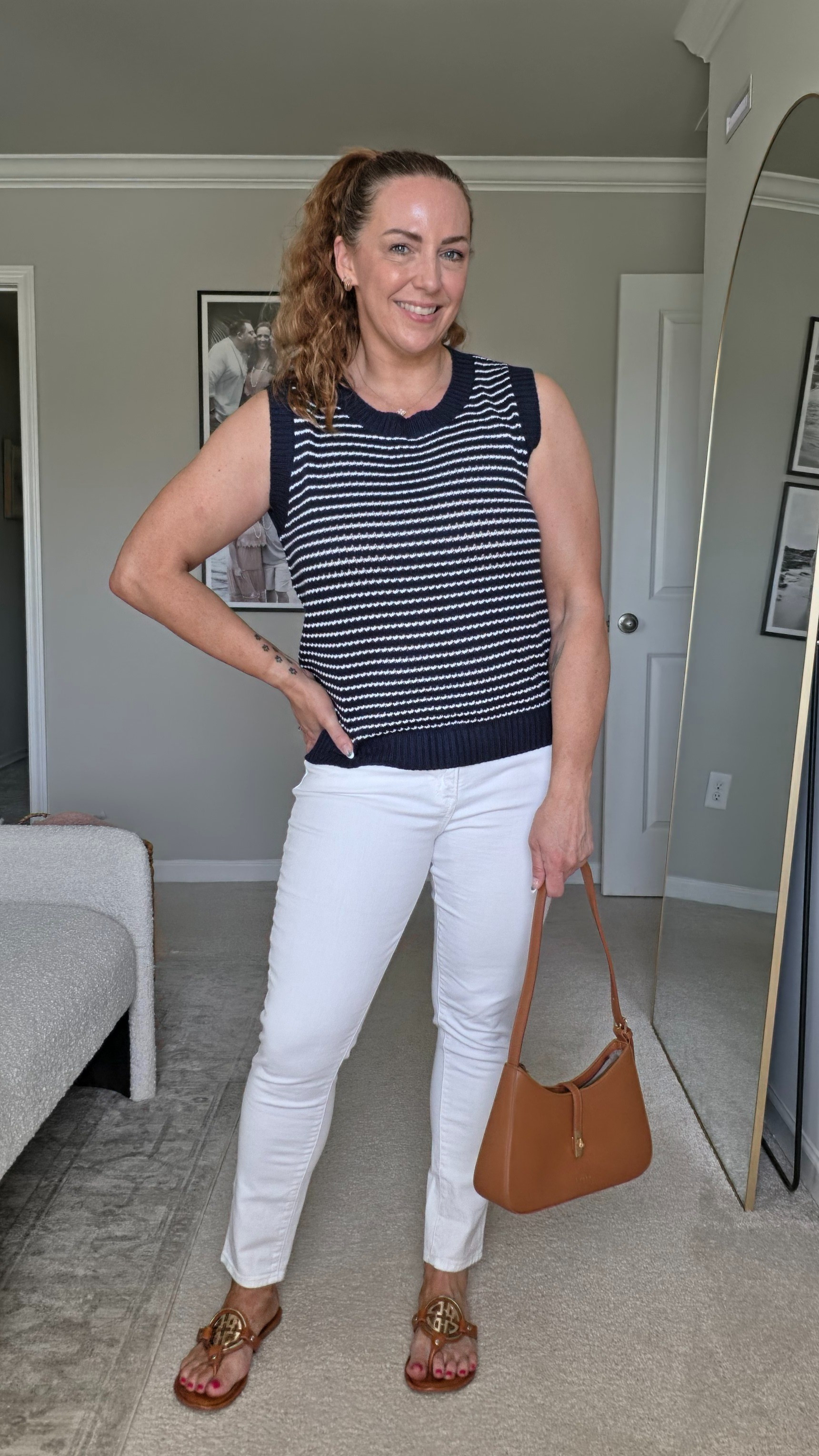 This striped knit sweater tank is the perfect breezy layer when paired with white denim and sandals.#summerstyle #knittop #casualoutfit #anrabess

#LTKOver40 #LTKSeasonal #LTKTravel