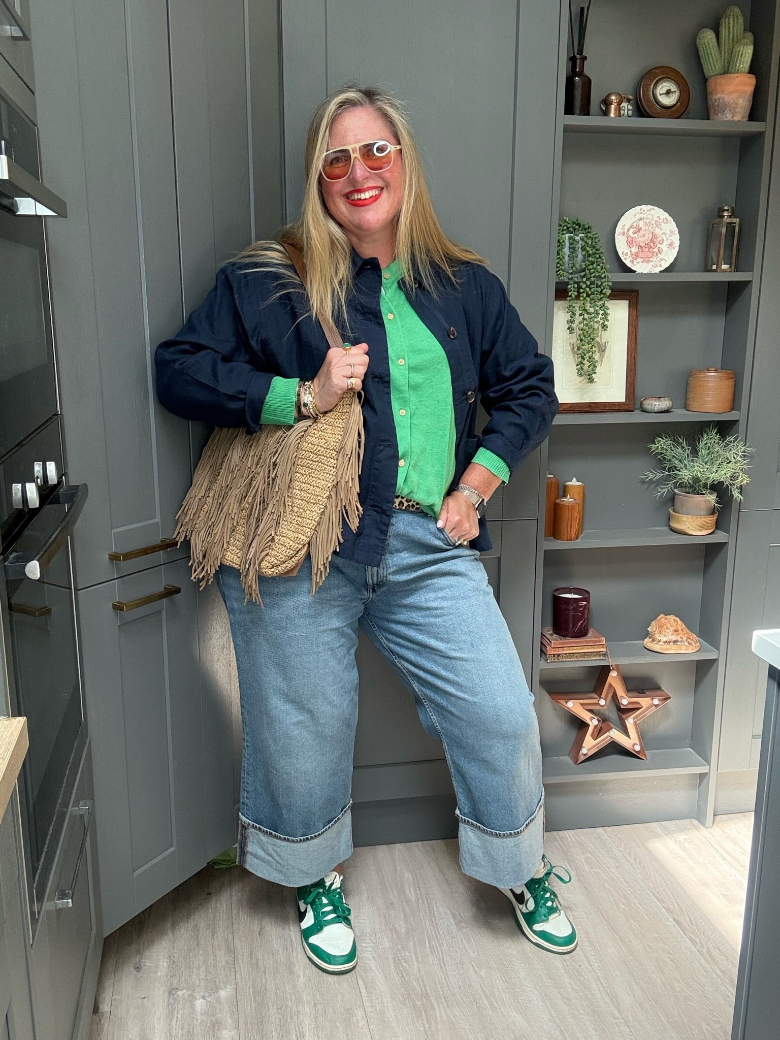Turn up jeans, green cardigan, navy linen jacket, tan bag, sunglasses

#LTKspring #LTKjeans #LTKplussize