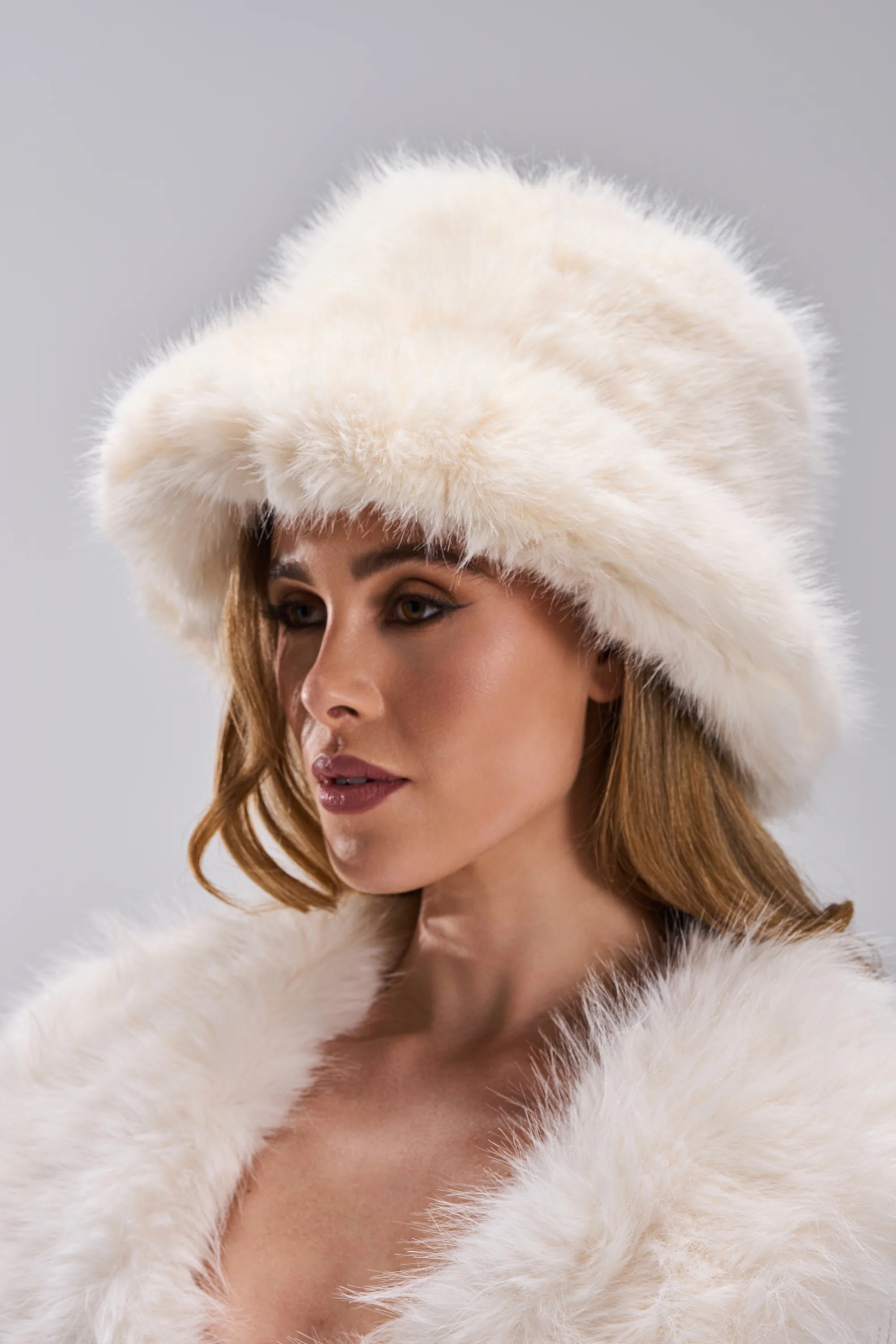BABY IT'S COLD OUTSIDE FAUX FUR BUCKET HAT IN IVORY | AKIRA