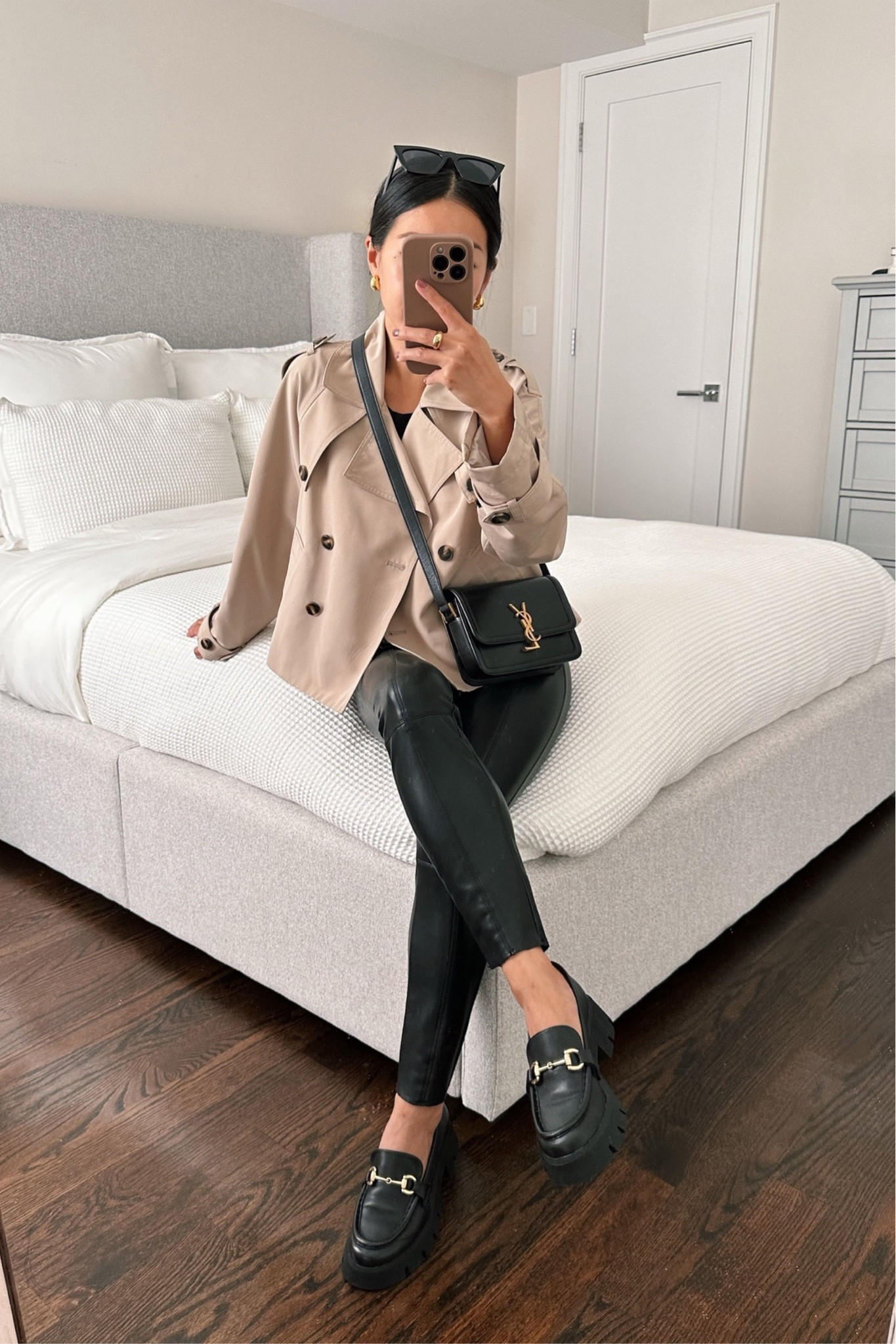 Fall Winter casual outfit with leather leggings 

• cropped trench coat - exact one is Steve Madden but sold out, linked similar.

•Topshop faux leather leggings size 0 petite - so comfortable with a soft fleecy lining and not thin! Great for staying warm in the winter . Runs a little small and fits me (I’m typically 00 / xxs petite)

• Chunky platform loafers sz 5 - I’m between a 5 and 5.5 and the reviews mentioned these run a little big so I took the 5. These take a little breaking in. For a comfortable, non-platform loafer I linked my favorite Loraine loafers which I take in a 5.5. 

•YSL Solferino small bag 

•Amazon sunglasses 

#LTKSeasonal #LTKfindsunder100 #LTKHoliday