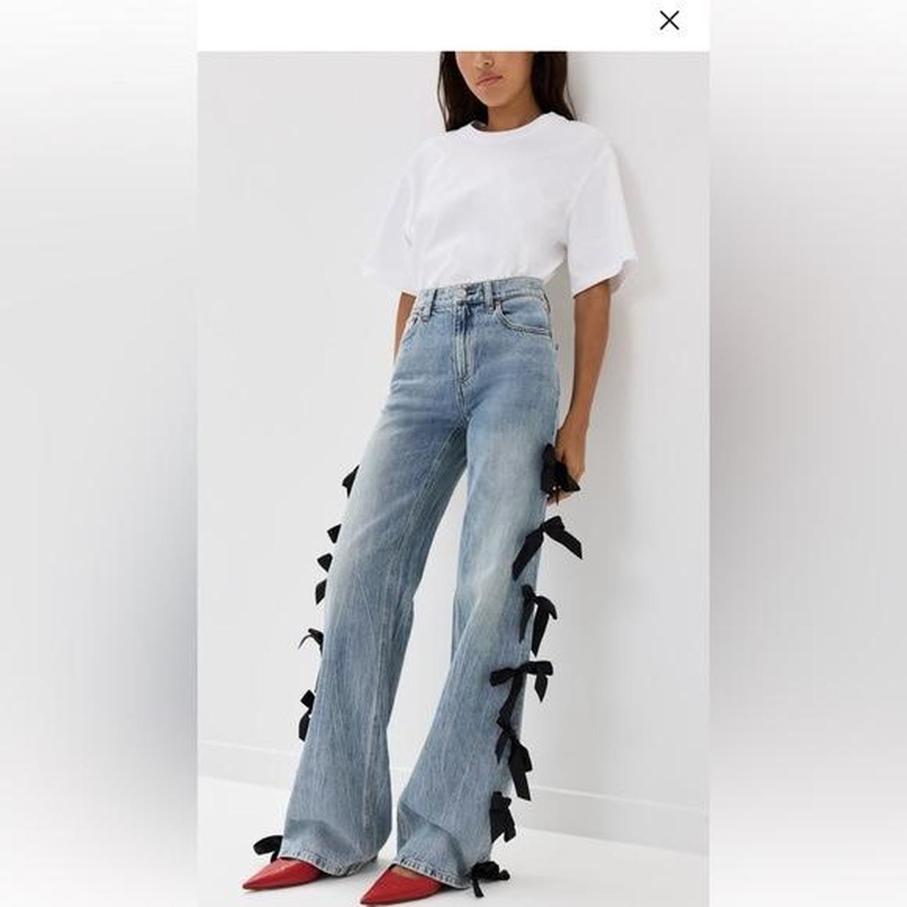NWT Alice + Olivia blue denim jeans with black bow... | Depop US