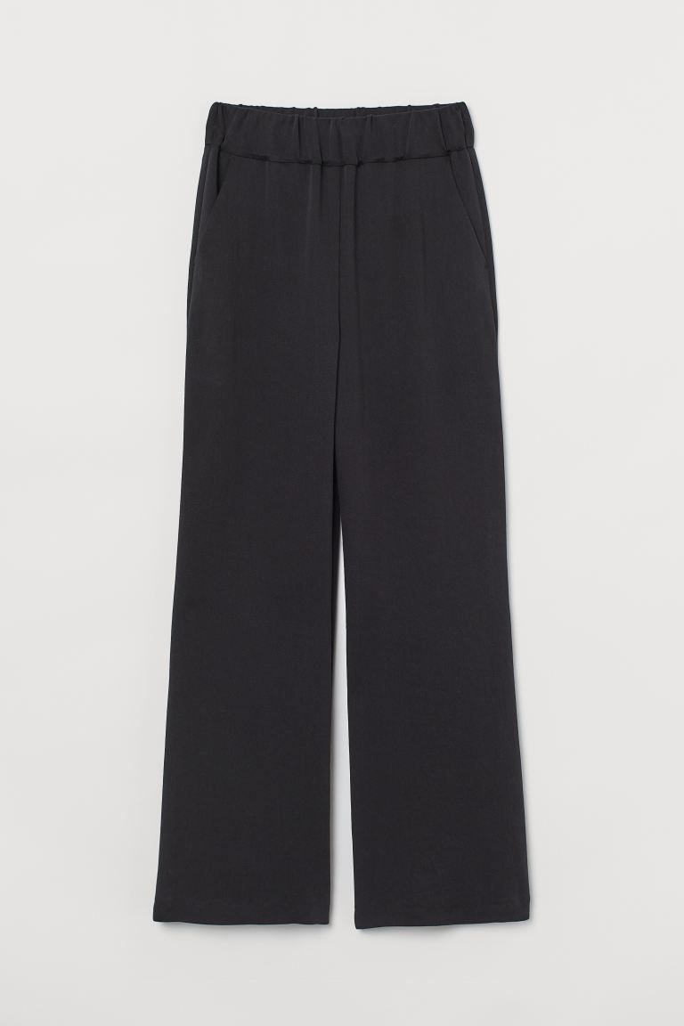 Pants in woven fabric made from a soft lyocell blend. High waist, waistband with covered elastic,... | H&M (US + CA)