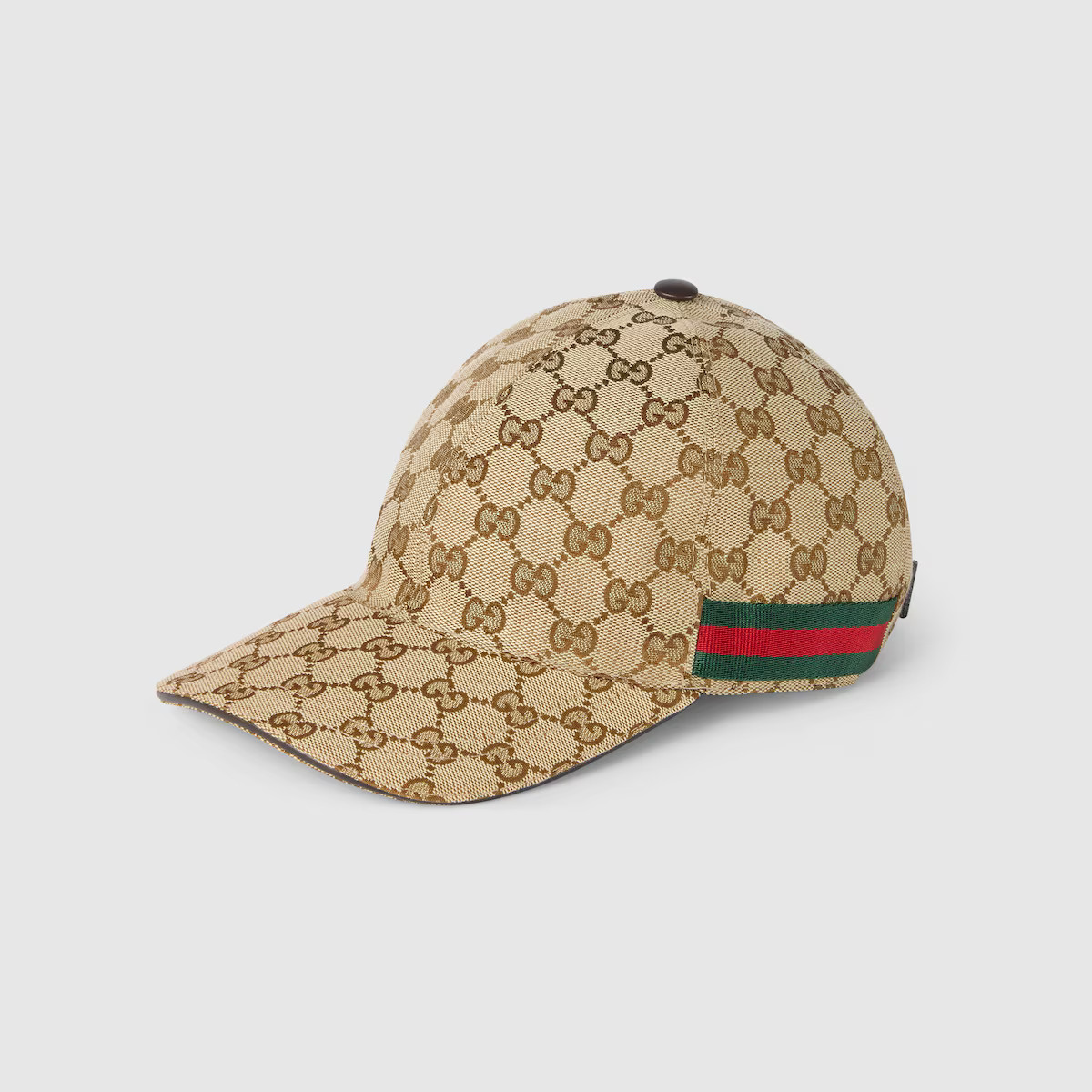 A classic baseball cap shape in GG canvas with Web detail. The Web was first developed by Gucci i... | Gucci (US)