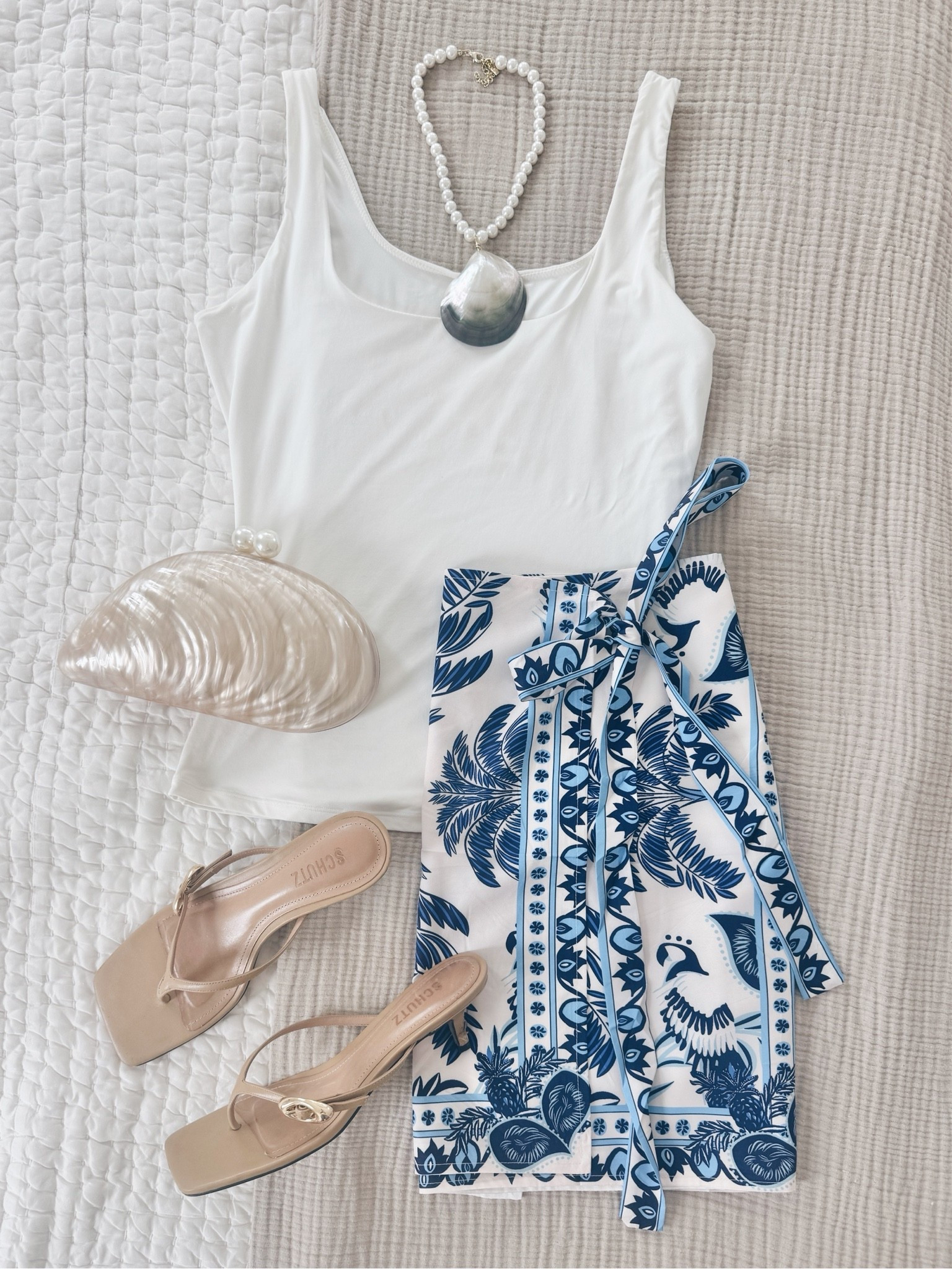 Vacation outfit. Date night outfit.  This wrap skirt is such a steal!  I have size small in tank and skirt. Sandals true to size.

#LTKgrwm #LTKTravel #LTKOver40