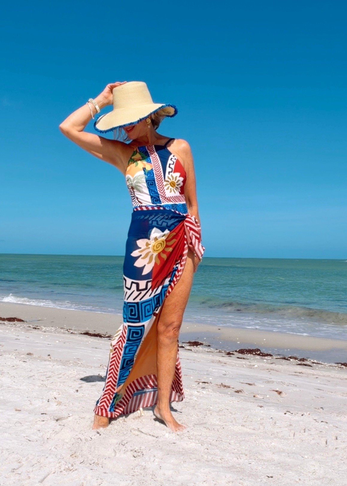 Gotex one piece swimsuit. Coverup is a large rectangle so it can be worn in many different ways.

#LTKOver40 #LTKSwim #LTKTravel