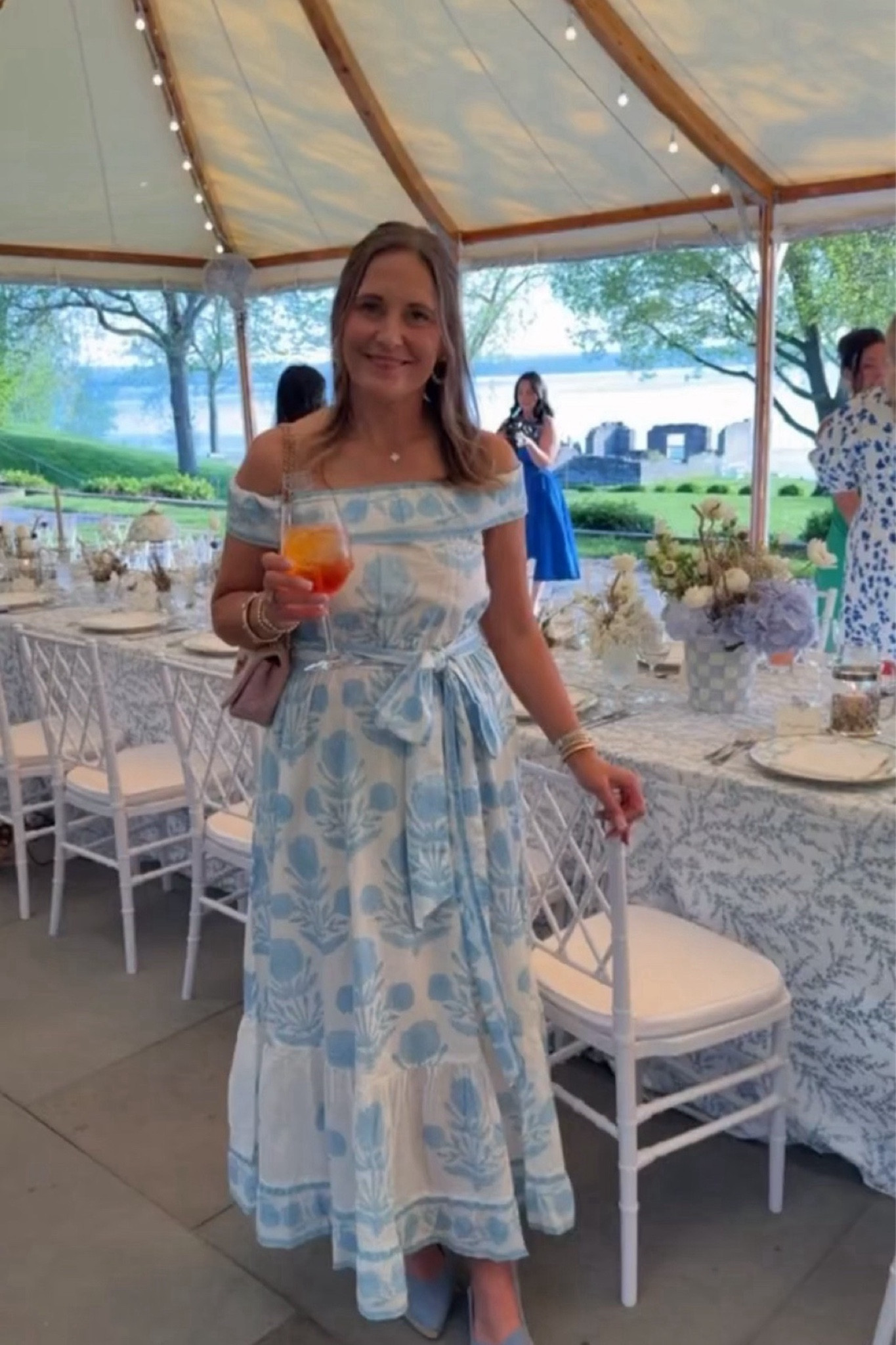 I loved wearing this dress to an event the other day! The blue and white print feels so fresh for summer, and it made getting ready so easy. It would be perfect for parties, vacation dinners, and any warm-weather plans.

#LTKOver40 #LTKSeasonal #LTKMidsize