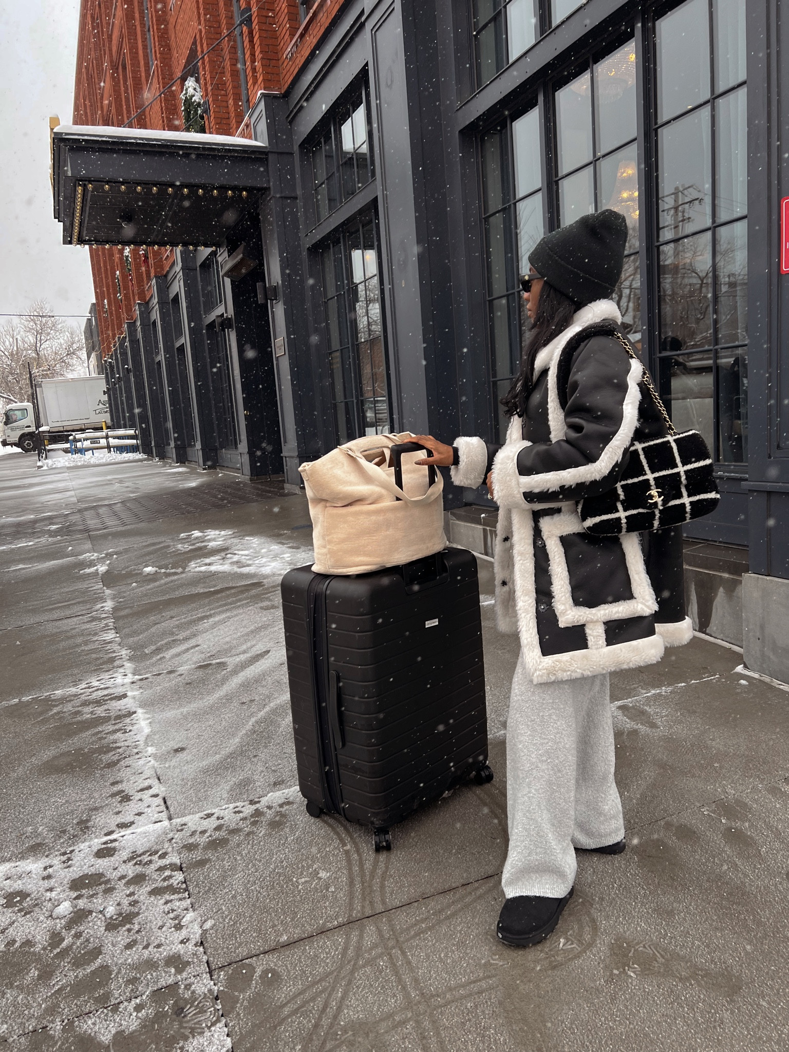 Travel look: away medium luggage suitcase, black shearling jacket (linked similar), Beis tote bag, beanie 

#LTKtravel #LTKstyletip #LTKFind