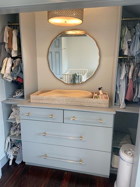 I love the way the nursery closet turned out so much. The gold mirror is fun for baby to look into and I love the coordinating changing tray and flush mount. Also liked by baby hangars and other nursery organization and nursery storage things

Nursery , nursery closet, changing tray , gold mirror , changing pad , flush mount , nursery decor , boy nursery , nursery inspiration , kids room , baby boy room , baby essentials , nursery essentials , nursery organ using 

#LTKhome #LTKbaby #LTKfamily