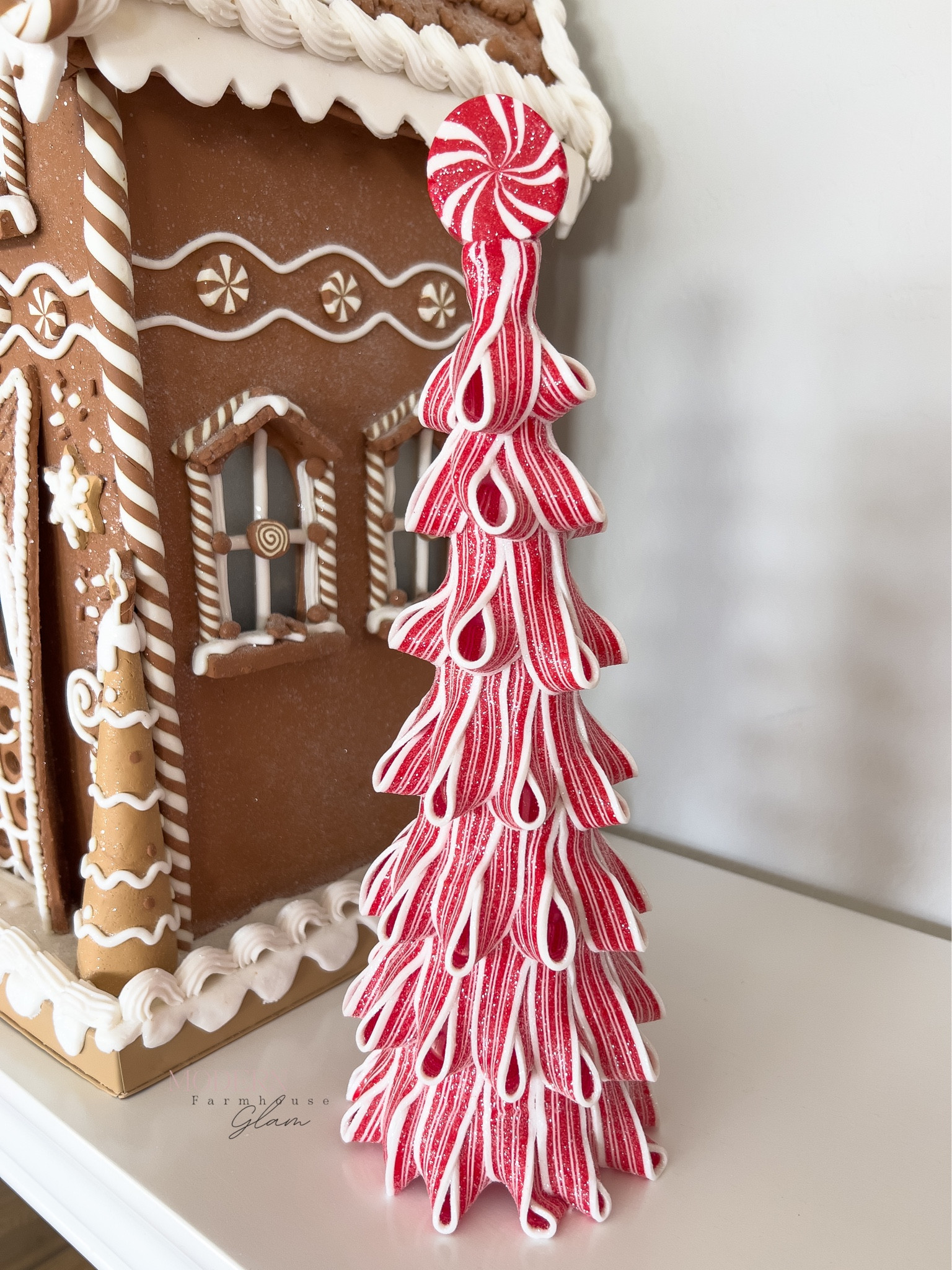 Adorable, red and white peppermint candy cane Christmas tree at Modern Farmhouse Glam. These are super popular and will sell out quick.  

#LTKhome #LTKHoliday #LTKHolidaySale