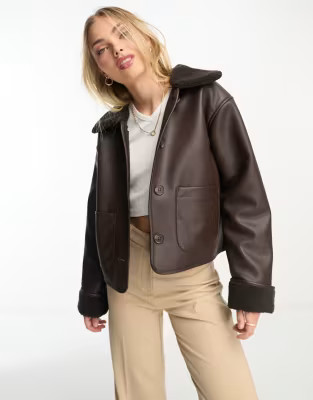 Monki cropped faux leather and shearling jacket in brown | ASOS (Global)