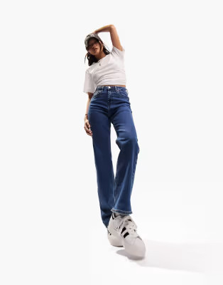 ASOS DESIGN Petite easy straight jeans in mid blue | ASOS (Global)