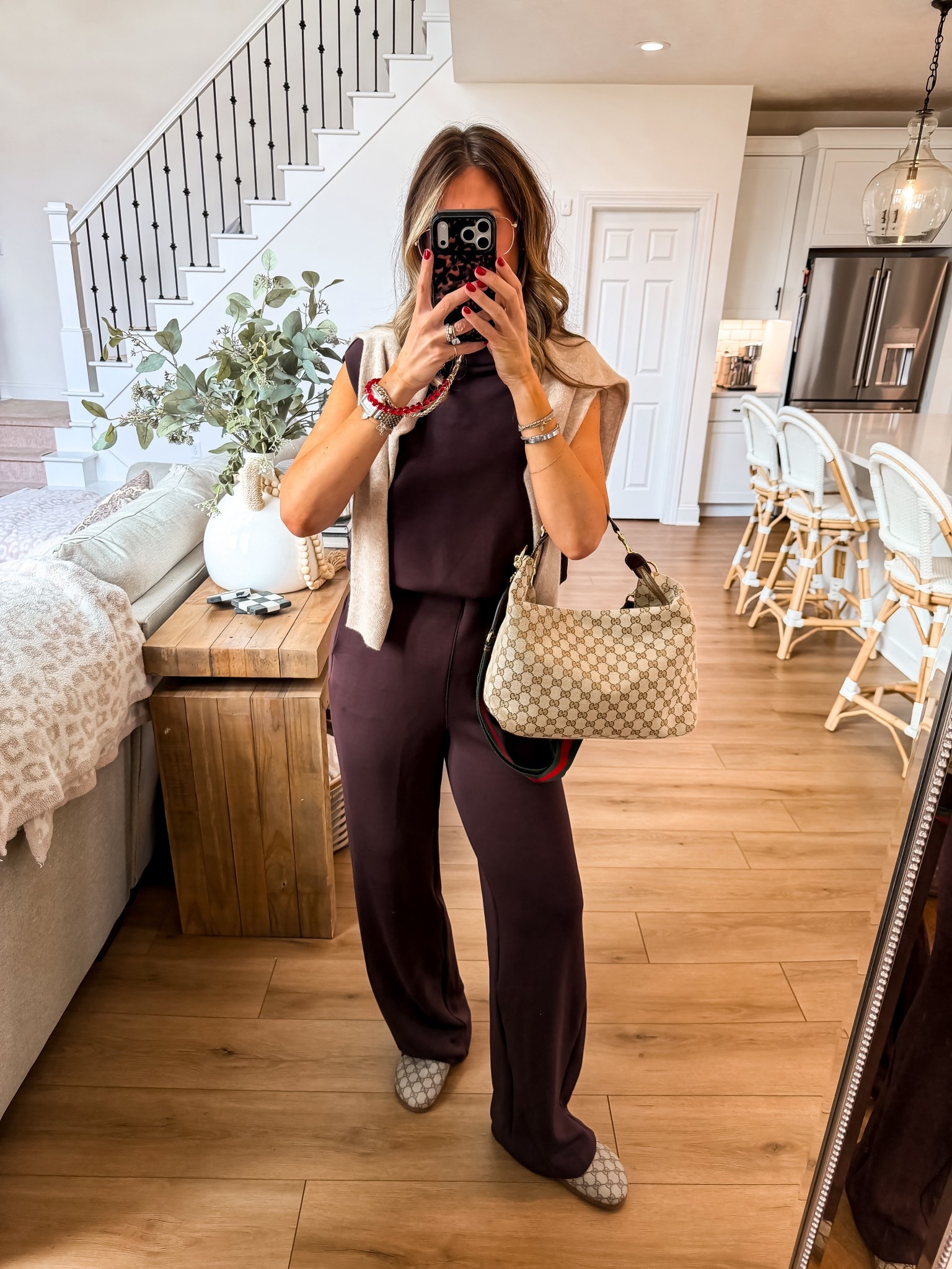 I just went ahead and order the red one. I love this jumpsuit so much. I’m wearing a medium tall here but I got the medium regular length next time to try. I love this so much. The back is detached so it’s easy to use the restroom. it’s so elevated and the material is unmatched.

#LTKOver40 #LTKootd #LTKMidsize