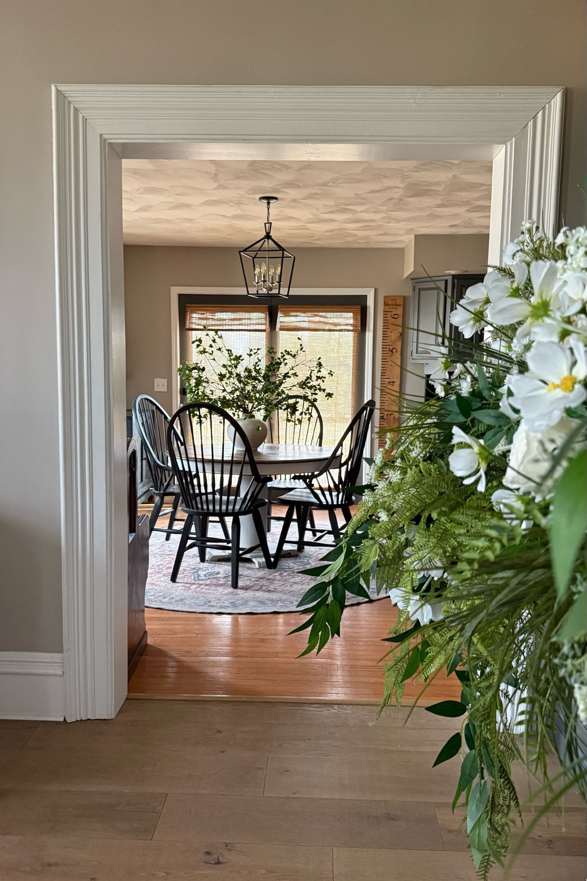 Farmhouse Dining Room.

Spring Centerpiece | Spring Decor | Spring Flowers | Black Modern Windsor Chairs | Round Pedestal Table | Wooden Blinds | Farmhouse Dining Pendant | Lantern Pendant |

#LTKSeasonal #LTKHome